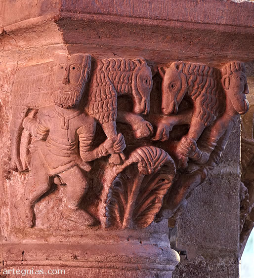 Hombres portando corderos