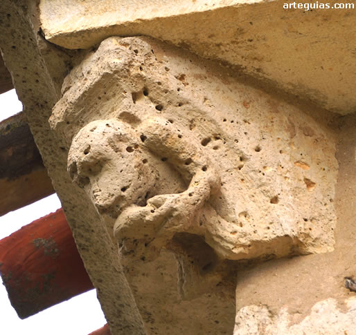 Canecillo con un mono