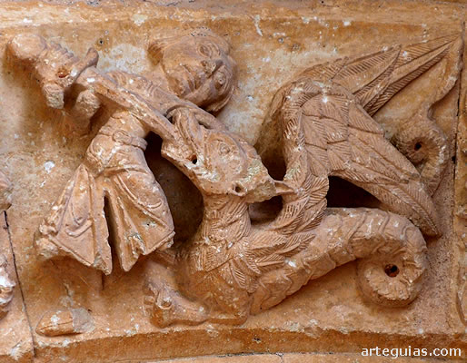 Un hombre clava la espada en la boca de un drag&oacute;n