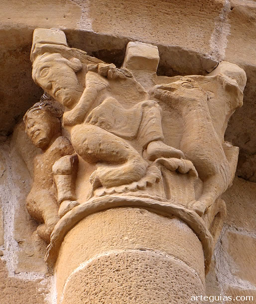 Basilisco atacando a dos hombres