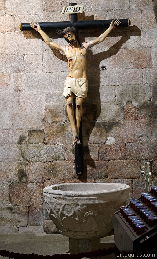 Cristo y pila bautismal