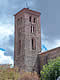 Torre de la iglesia junto a las murallas de Buitrago